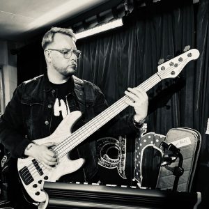 overwater artist Phillip court playing bass