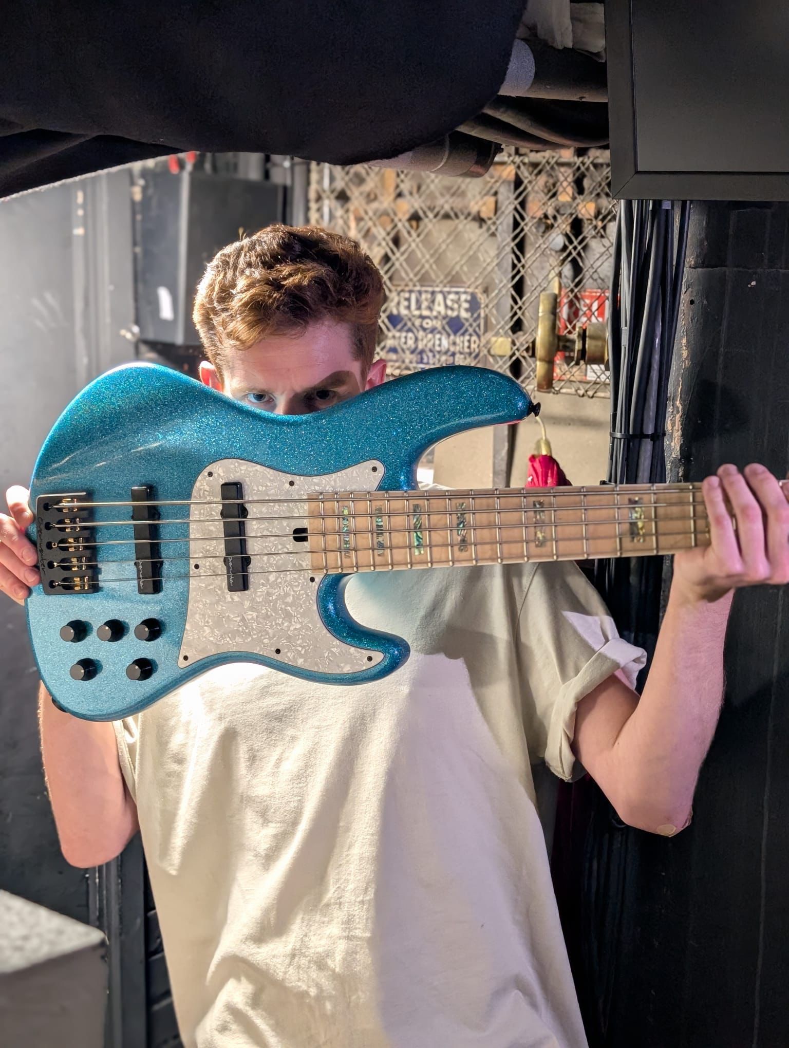 SamE Bassist Carlos Henriquez plays his Overwater Hybrid 5 string bass