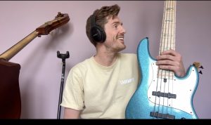 bassist sam edgington with his blue overwater bass